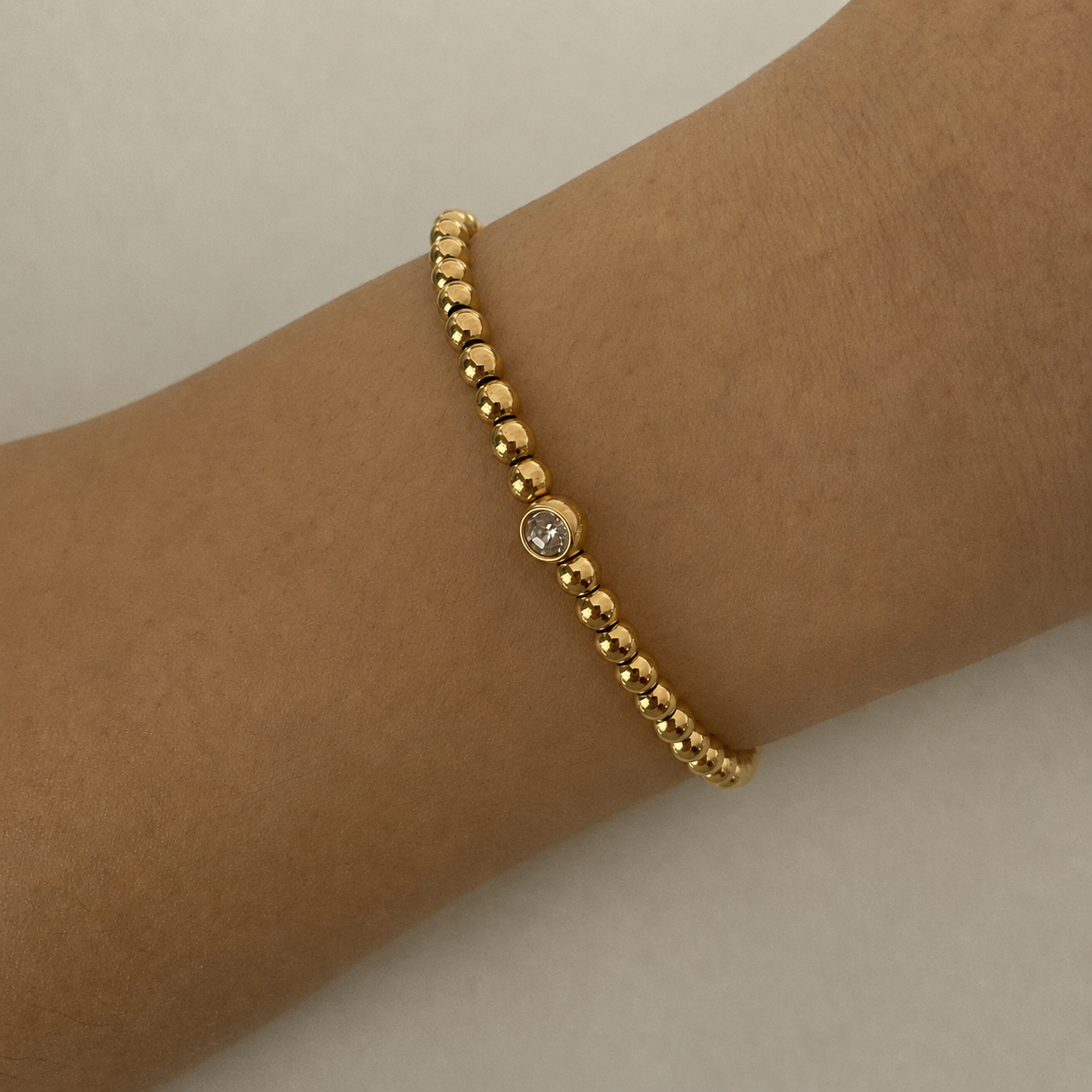 Gold Beaded Bracelet with Zircon